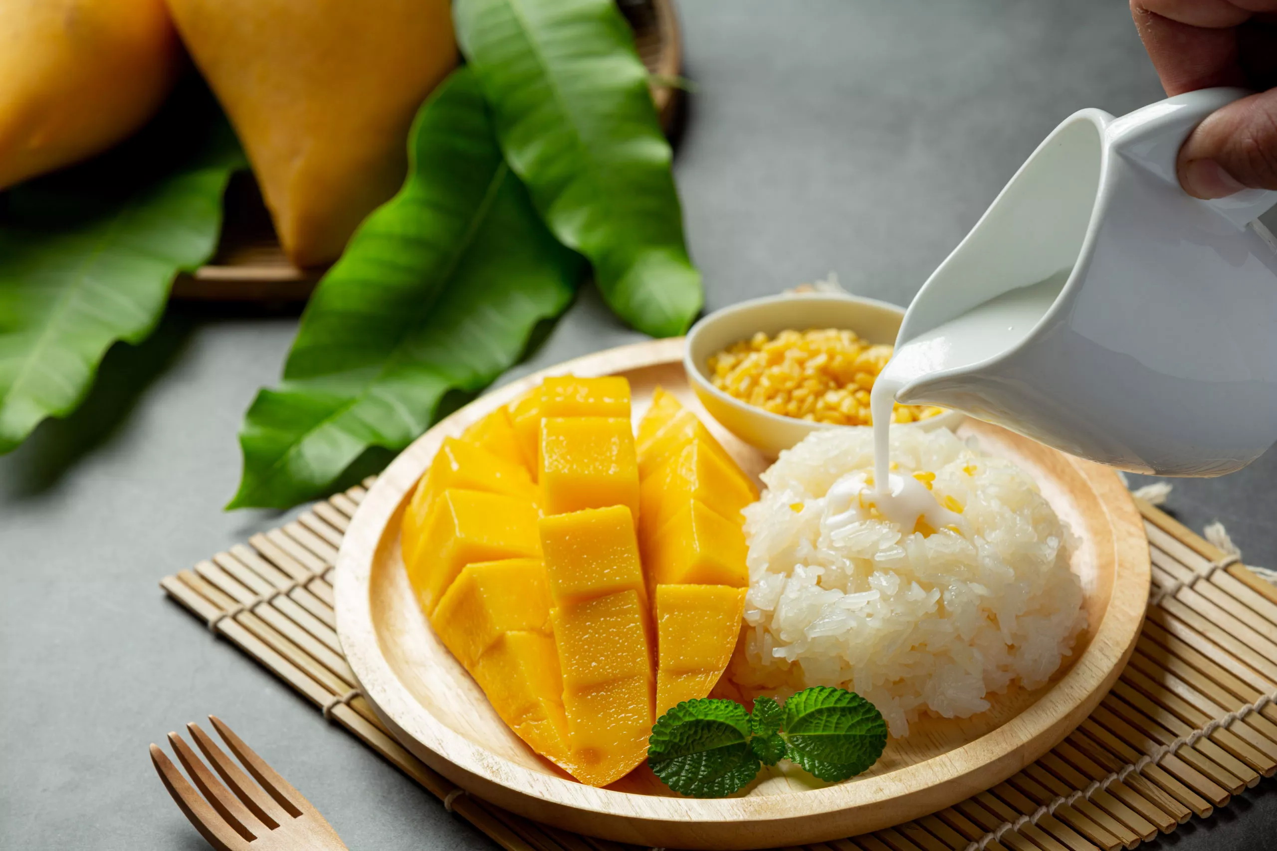 fresh ripe mango sticky rice with coconut milk dark surface scaled 1